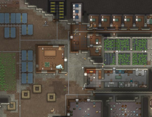 Capture d'écran d'une colonie RimWorld, montrant la salle commune, les ateliers, les champs et bassins hydroponiques, les chambres inviduelles...